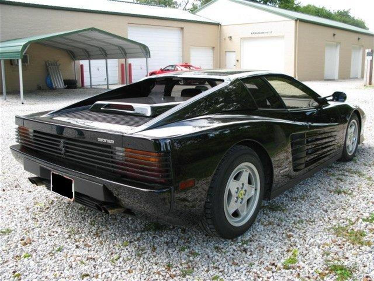 white 1991 ferrari testarossa